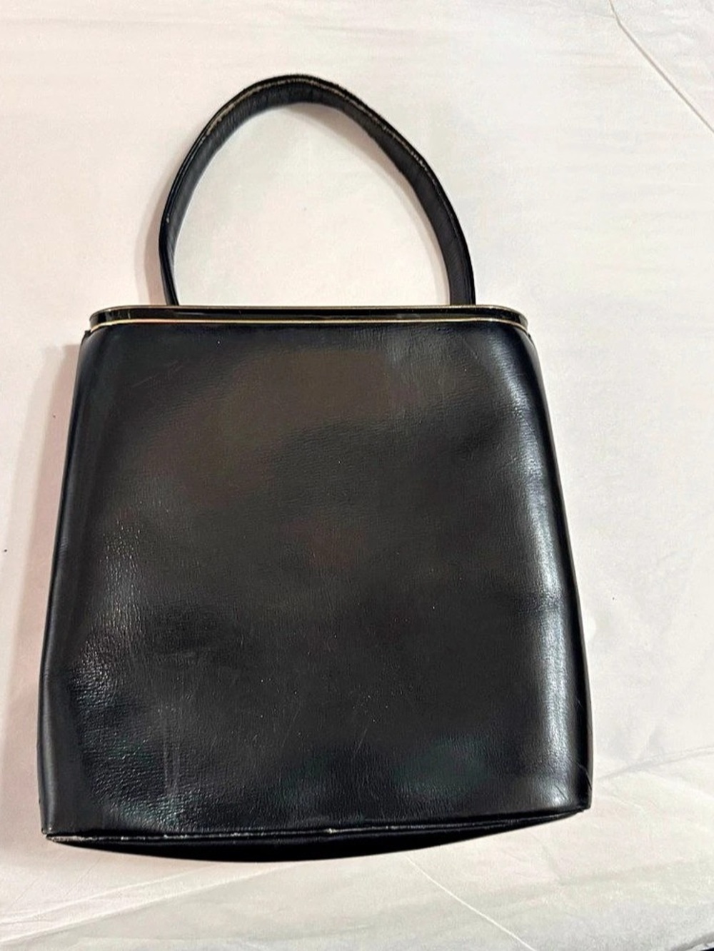 vintage mid-century structured black leather top-handle handbag